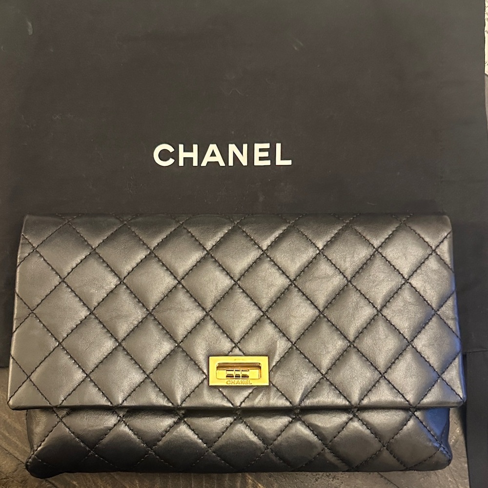 CHANEL Black Quilted Leather Clutch with Gold Hardware